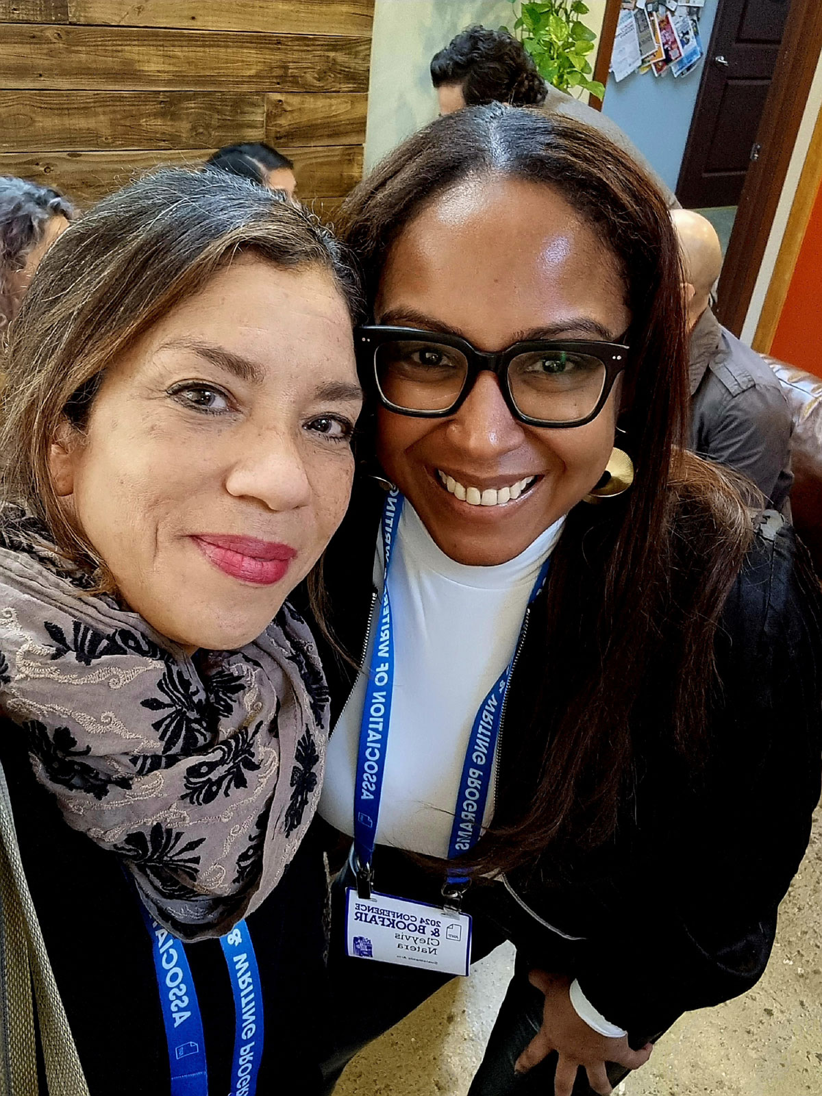 Two women smile in a selfie